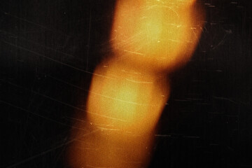 Abstract scratched damaged retro analog film effect, red yellow orange light leaks rays, grainy...