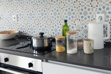 Real home kitchen countertop in Mediterranean style. Concept real life, everyday life, healthy cooking, authenticity