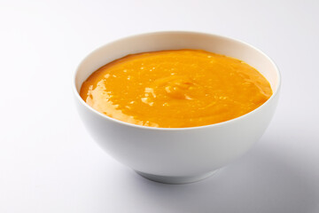 Aam ras served in ceramic bowl. Delicious Indian dessert