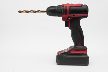 modern cordless screwdriver on a white background with a drill bit