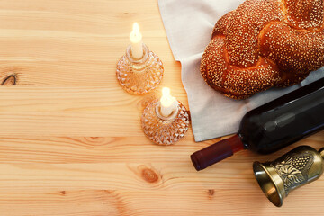 Image of Shabbat, challah bread, wine and candles