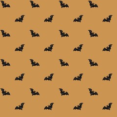 Seamless Halloween bat pattern on a warm autumnal background for festive decorations