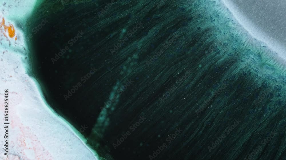 Poster ink flows organically in macro shot, forming dreamy abstract shapes and textures