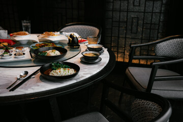 Elegant Asian Dining. Asian Table and Chairs in Restaurant.