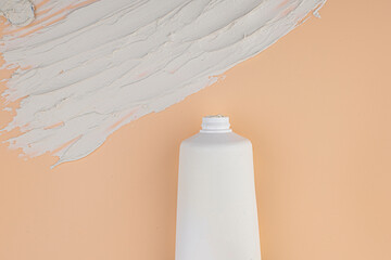 White plastic cosmetics container for cream