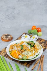 Traditional Indonesian salad made of boiled vegetables, tofu, eggs, and tempeh, served with rich peanut sauce. A flavorful and healthy plant-based dish.