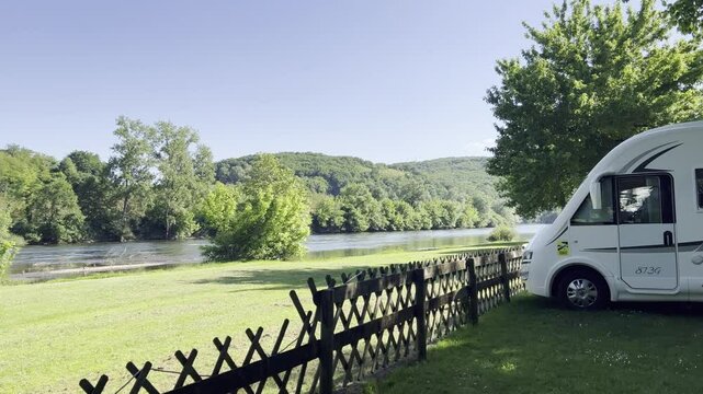 Camper van parked near Dordogne river in La Roque Gageac, France