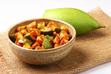 Mango Pickle Homemade Mango Pickle or aam ka achar or achaar in white bowl, selective focus