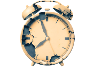 Old broken alarm clock with cracks, vintage style isolated on white background PNG