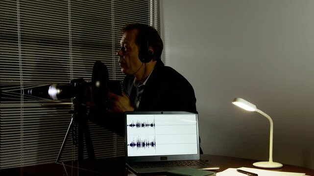Modern spy equipment - laptop with audiogram, professional camera and directional microphone.