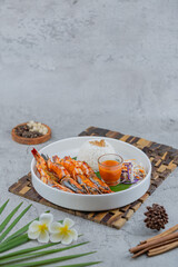 Indonesian-style shrimp cooked in Padang chili sauce. A bold, spicy seafood dish rich in flavor, perfect for showcasing traditional Indonesian cuisine and vibrant food visuals.