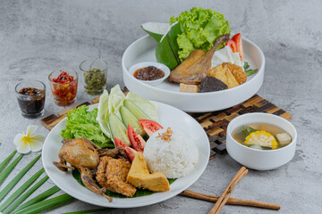 Traditional Indonesian Delicacies: Duck Rice and Malon Bird Dish