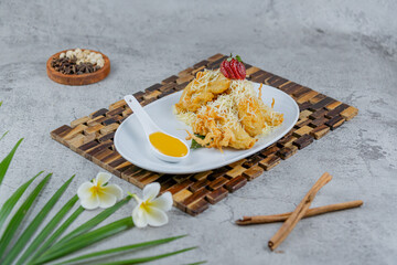 Indonesian Fried Banana with Cheese Topping