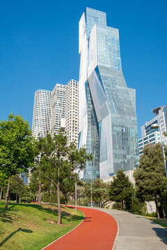 La Mexicana Park bike path in Santa Fe, Mexico City, urban landscape with tall buildings, green space, and pathways, ideal for city living and lifestyle stock images.