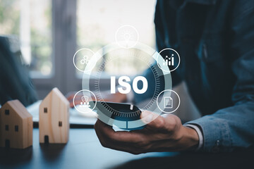 Business people working Laptops with ISO standards quality control concept, assurance warranty, Quality control standards, Researching international standards organization, Business technology concept