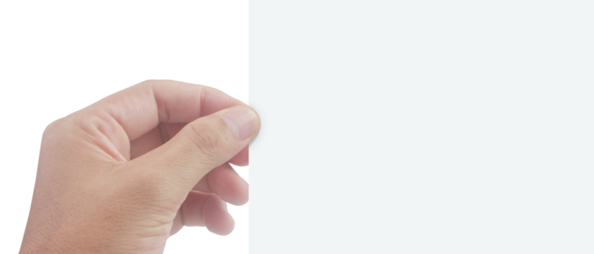 Hand holding blank paper indoor setting creative concept minimalist environment close-up view for design purposes