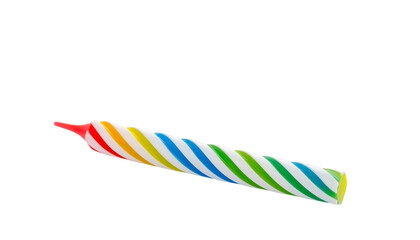 Obraz premium Colorful rainbow cake candle designed for celebrations and festive occasions cutout isolated on solid white background