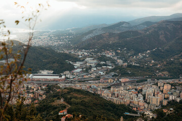 Panoramic view overlooking genova city, italy, during sunset