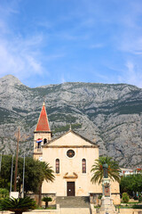 Cathedral of St. Mark and town square in Makarska, Croatia. Makarska is popular summer travel destination.