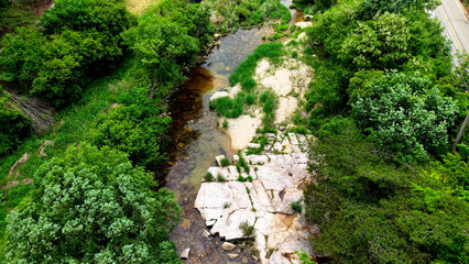 Aerial Drone Footage of a Clear Mountain Stream Flowing Through Mungyeong Countryside in Late...
