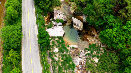 Aerial Drone Footage of a Clear Mountain Stream Flowing Through Mungyeong Countryside in Late Spring and Early Summer, Korea
