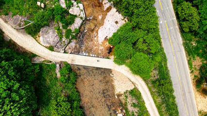 Aerial Drone Footage of a Clear Mountain Stream Flowing Through Mungyeong Countryside in Late Spring and Early Summer, Korea