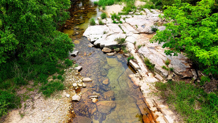 Aerial Drone Footage of a Clear Mountain Stream Flowing Through Mungyeong Countryside in Late Spring and Early Summer, Korea
