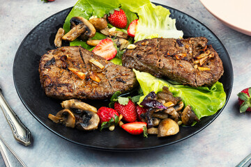 Beef BBQ and strawberry salad.