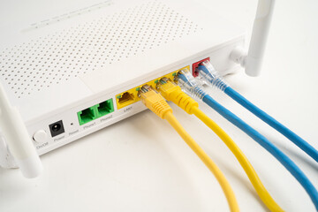 Ethernet cable with wireless router connect to internet service provider network.
