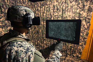 Modern soldier using advanced tactical simulation and virtual reality technology