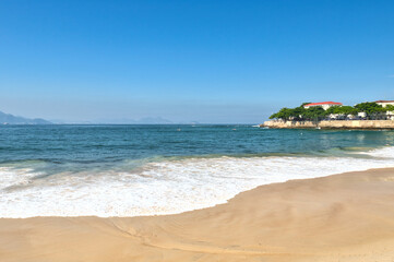 Rio de Janeiro, Brazil, May 19, 2025: Copacabana Beach is a beach located in the Copacabana neighborhood, in the South Zone of the city of Rio de Janeiro, Brazil. Beautiful blue skies and golden sand
