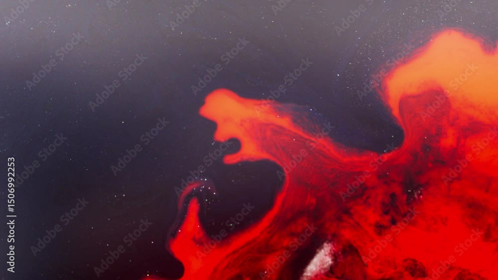 Poster swirling red alcoholic ink forms abstract patterns in macro with a cosmic feel