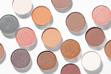 Beautiful eyeshadow refill pans on white background, flat lay