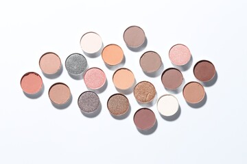 Beautiful eyeshadow refill pans on white background, flat lay