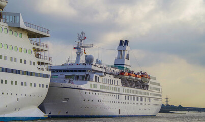 Classic small cruiseship cruise ship liner Astor docked at terminal in Tilbury, London on River...