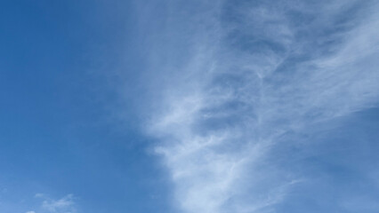 Whispering cirrus clouds dance across azure skies, celestial wanderings evoke contemplative serenity, akin to Tanabata or Cloud Appreciation Day