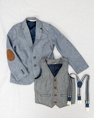 Formal cotton set for the young gentleman in grey color. Jacket with elbow patches, vest and suspenders. Size 128 (6-8 years).