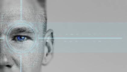 Close-up of a digital biometric eye scan with futuristic technology elements showcased on a human face