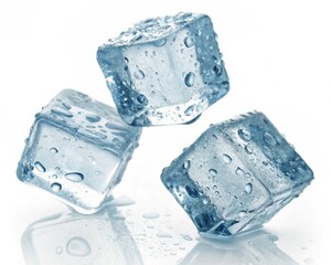Obraz premium Three wet ice cubes falling isolated on white background