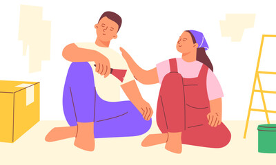 Concept of repair, renovation. Guy and a girl are renovating a flat