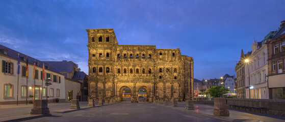 Porta Nigra at sunset showcasing ancient Roman architecture in Trier, Germany