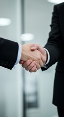 Business Handshake in a Modern Office