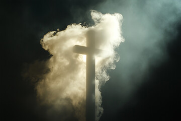 A dramatic and atmospheric image of an Orthodox cross surrounded by swirling smoke in a darkened room, illuminated by a single divine ray of light.