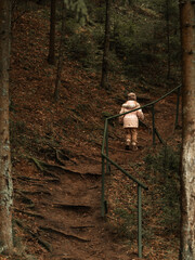 girl walking in the forest