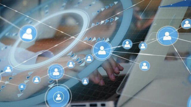 Typing hands initiating network graphic on laptop, populating user icons for data connection