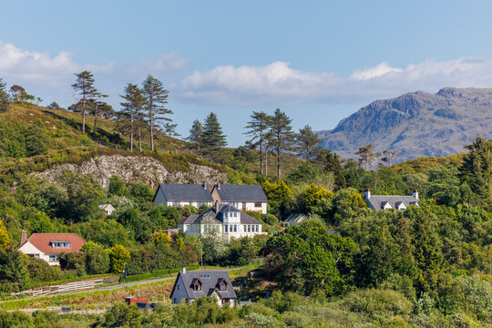Picturesque Highland Community in Morar, Near Arisaig, Scotland &ndash; Green Hills, Scattered Cottages, and Distant Rocky Mountains on a Bright Summer Day