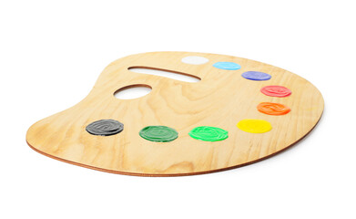 Wooden palette with paints isolated on white