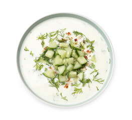 Tasty cucumber soup with dill and nuts in bowl isolated on white, top view
