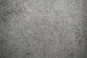 Fototapeta premium Aged Silver Metal Texture – Worn-Out Marks and Subtle Patina for a Refined, Weathered Aesthetic