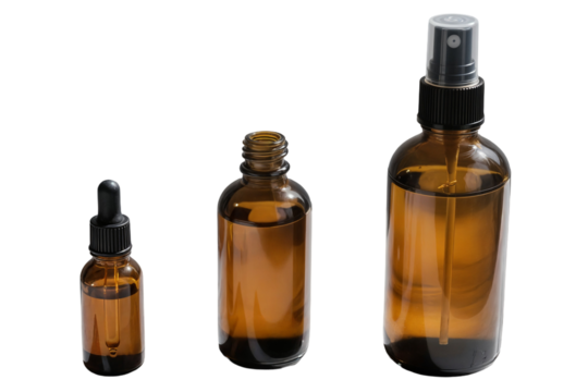 three amber-colored glass bottles of increasing sizes all designed for storing liquid products like essential oils tinctures or other sensitive substances concept png transparent no background